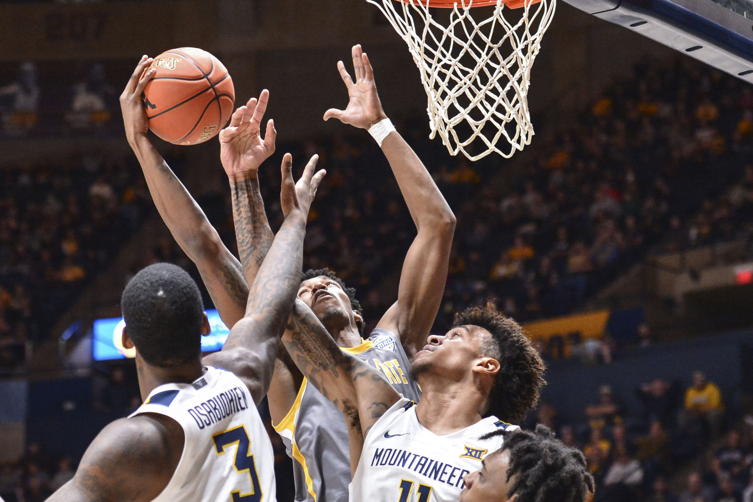 WVU NOTEBOOK: Huggins believes defense is improving at a time when Big 12 teams rank as nation's best stoppers